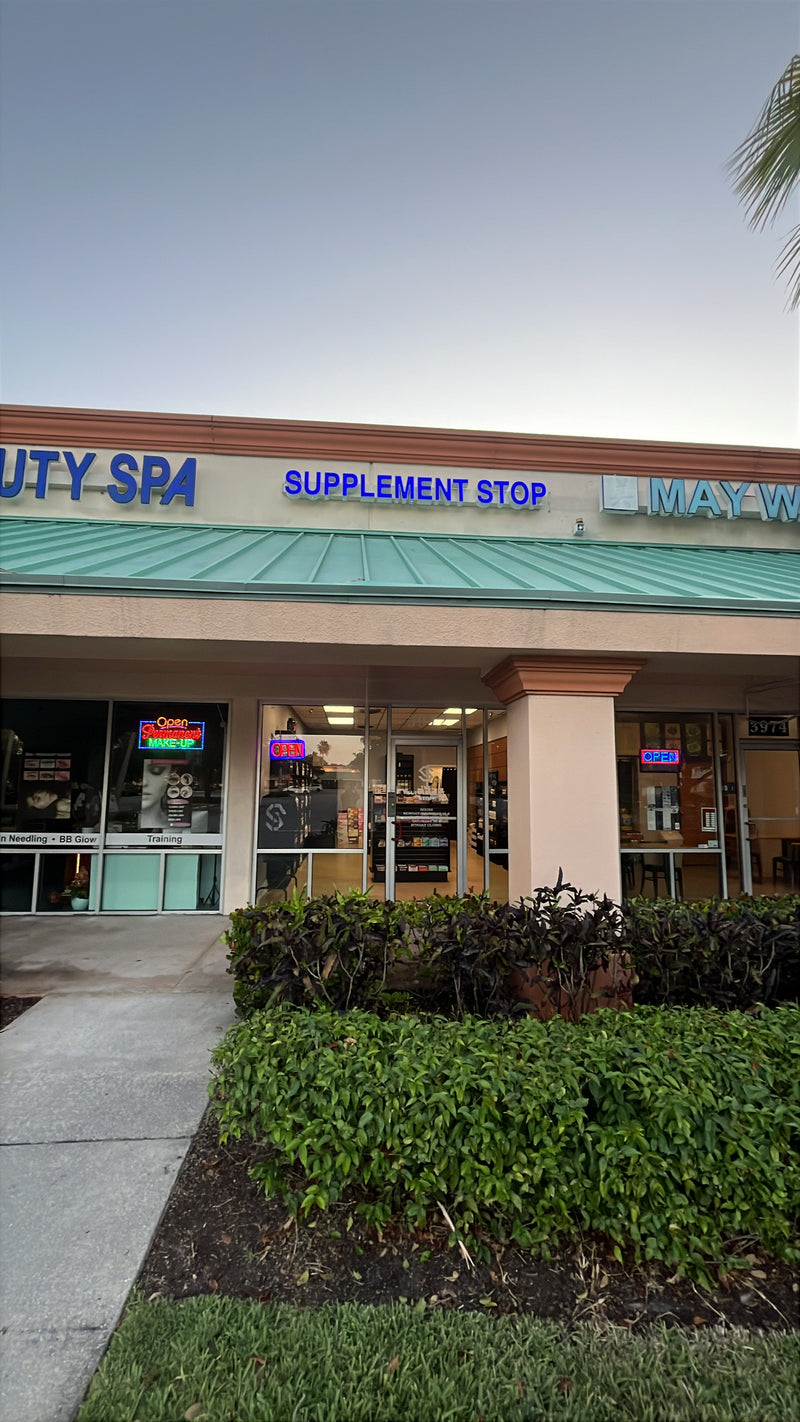 Exterior of The Supplement Stop store featuring branded signage and storefront—welcoming customers to shop health, fitness, and nutrition supplements.
